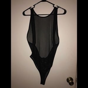 Size large, sheer body suit, new with tags